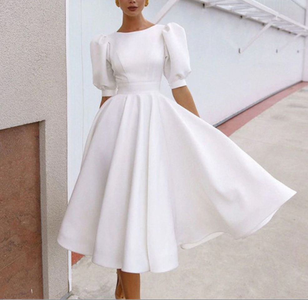 How to Style a White Midi Dress for Any Occasion