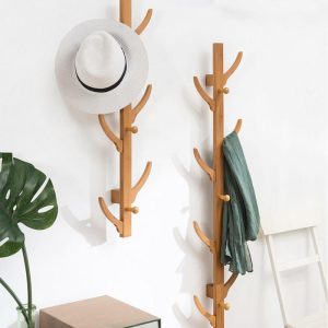 Comment le portemanteau mural s'agence-t-il avec d'autres meubles de rangement ?