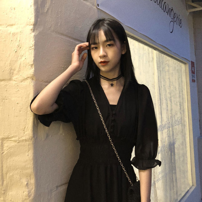 How to Dress Up a Long Sleeve Black Dress for the Office
