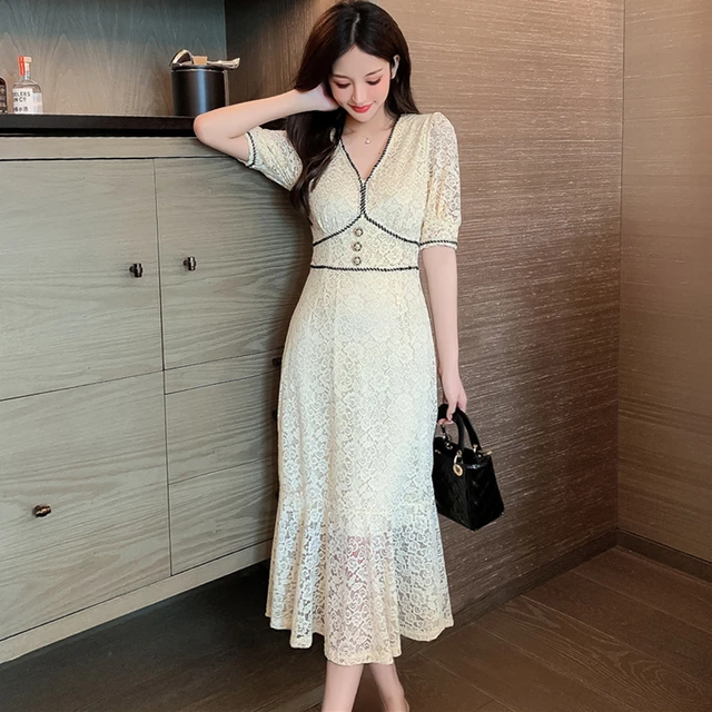 From Delicate Pearls to Dazzling Diamonds: Enhancing White Midi Dresses with Gems