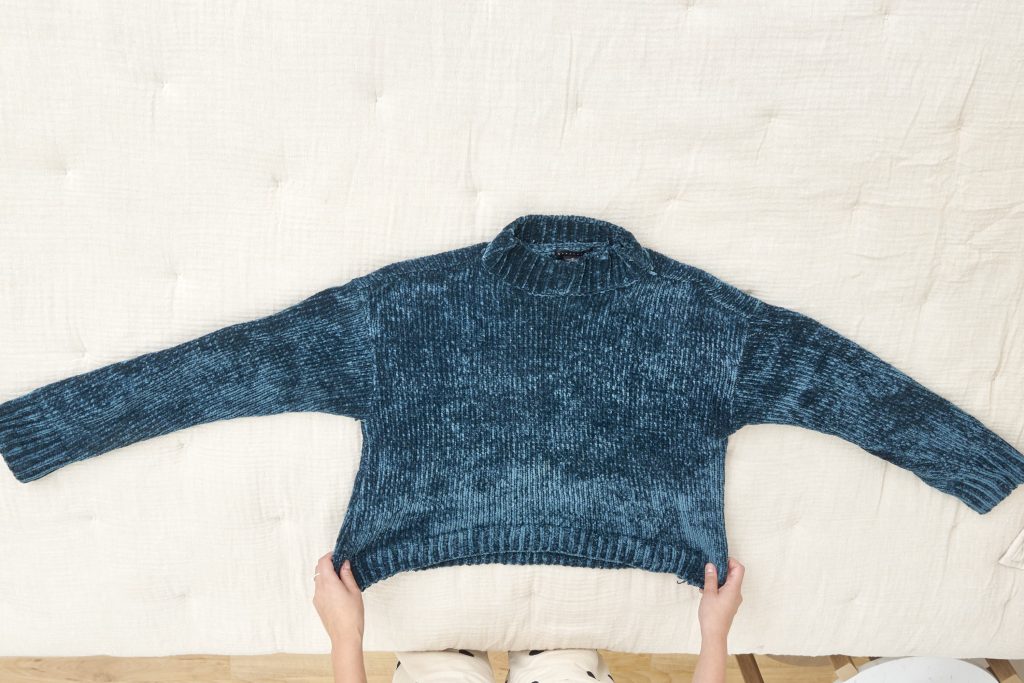 fold or hang sweaters