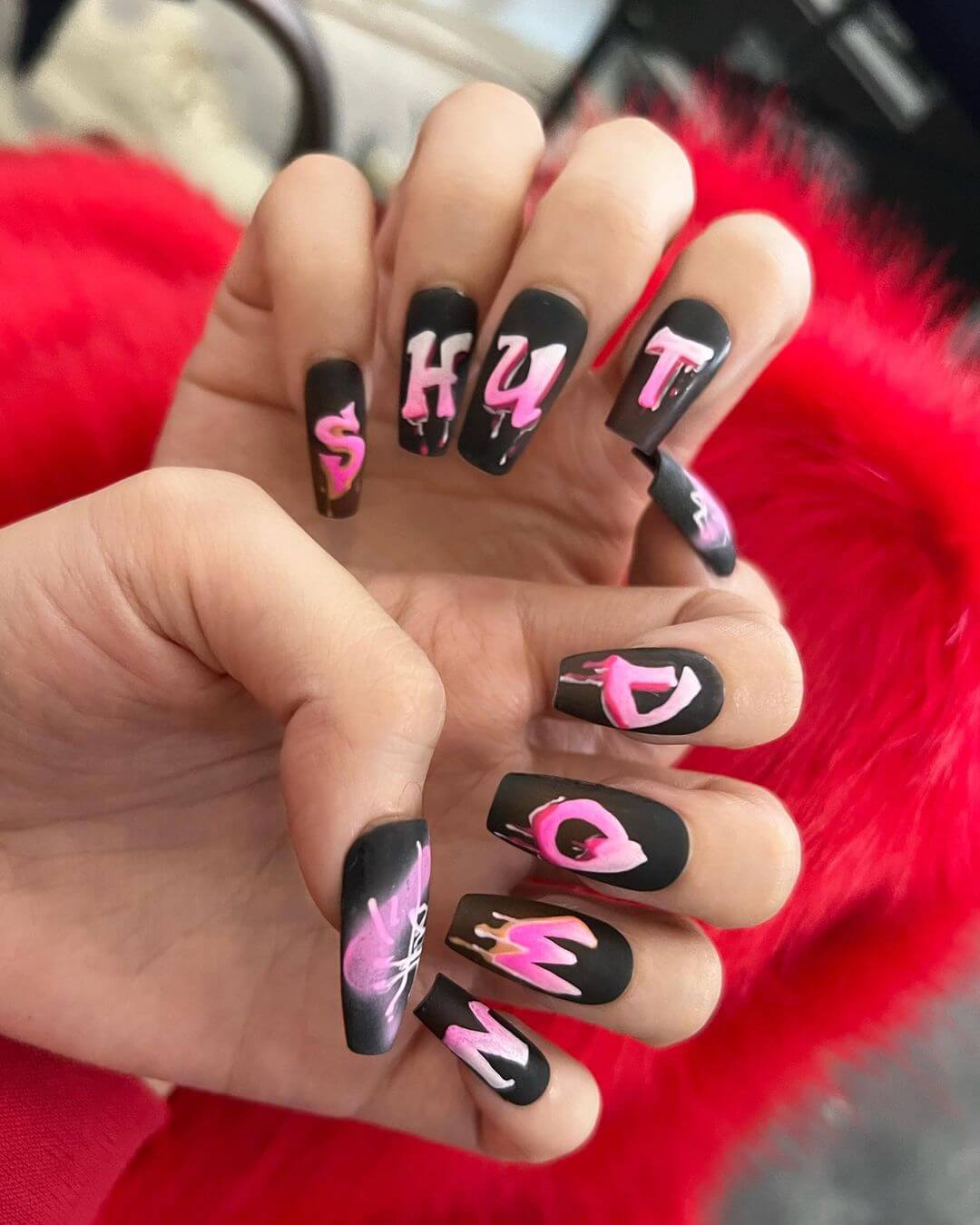 black and pink nails