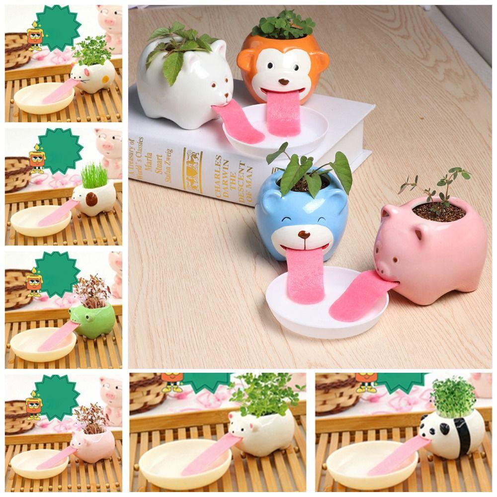 Whimsical Gardens: Interactive Cat Toys Among Flower Pots