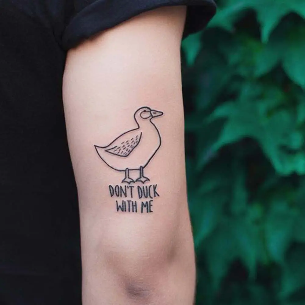 duck with knife tattoo