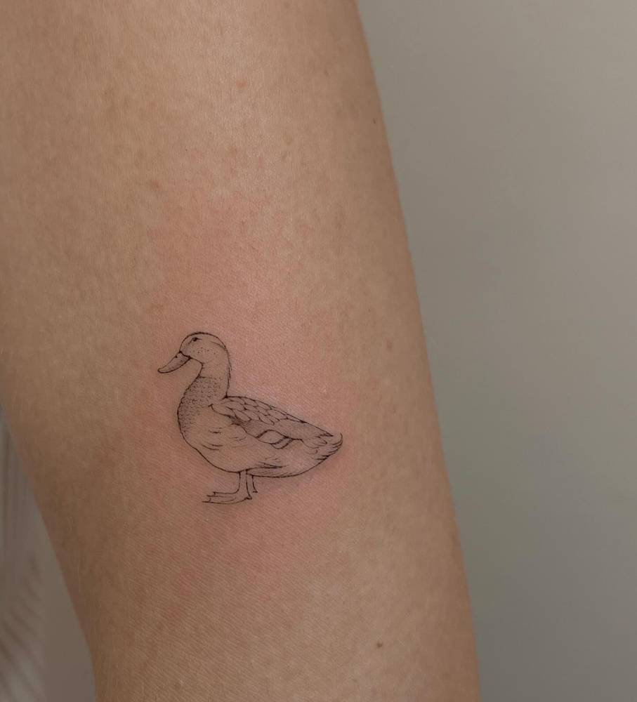 duck with knife tattoo