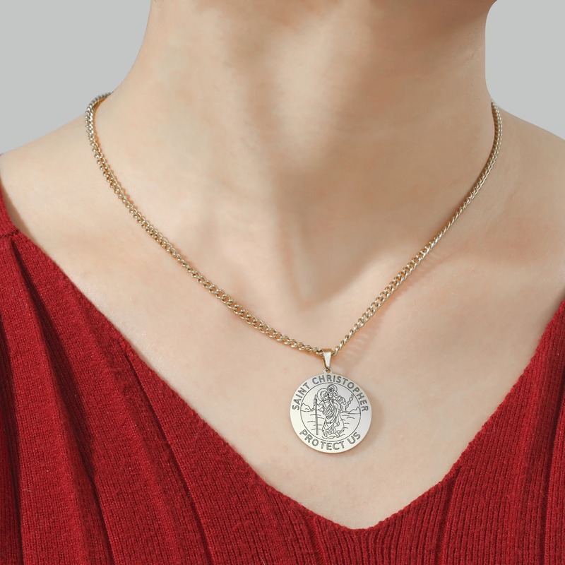 Wearing Saint Christopher protection necklace