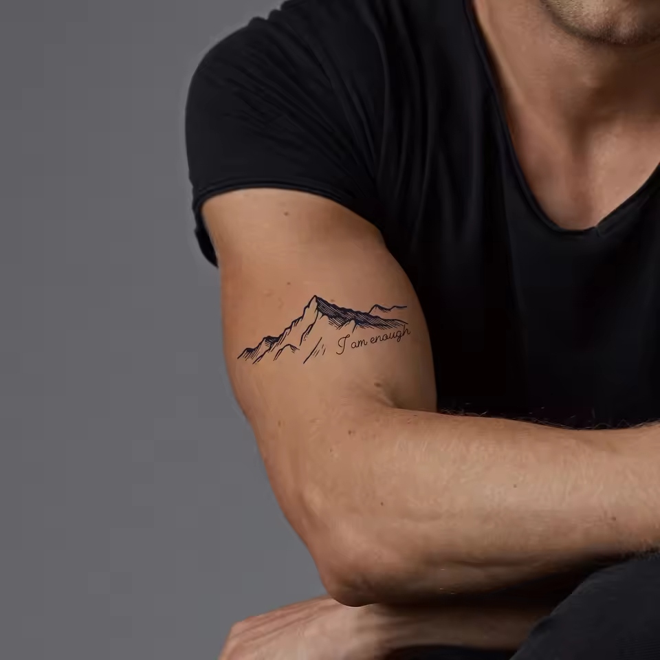 A mountain tattoo often represents strength and stability. It reflects the wearer's resilience and unwavering spirit.