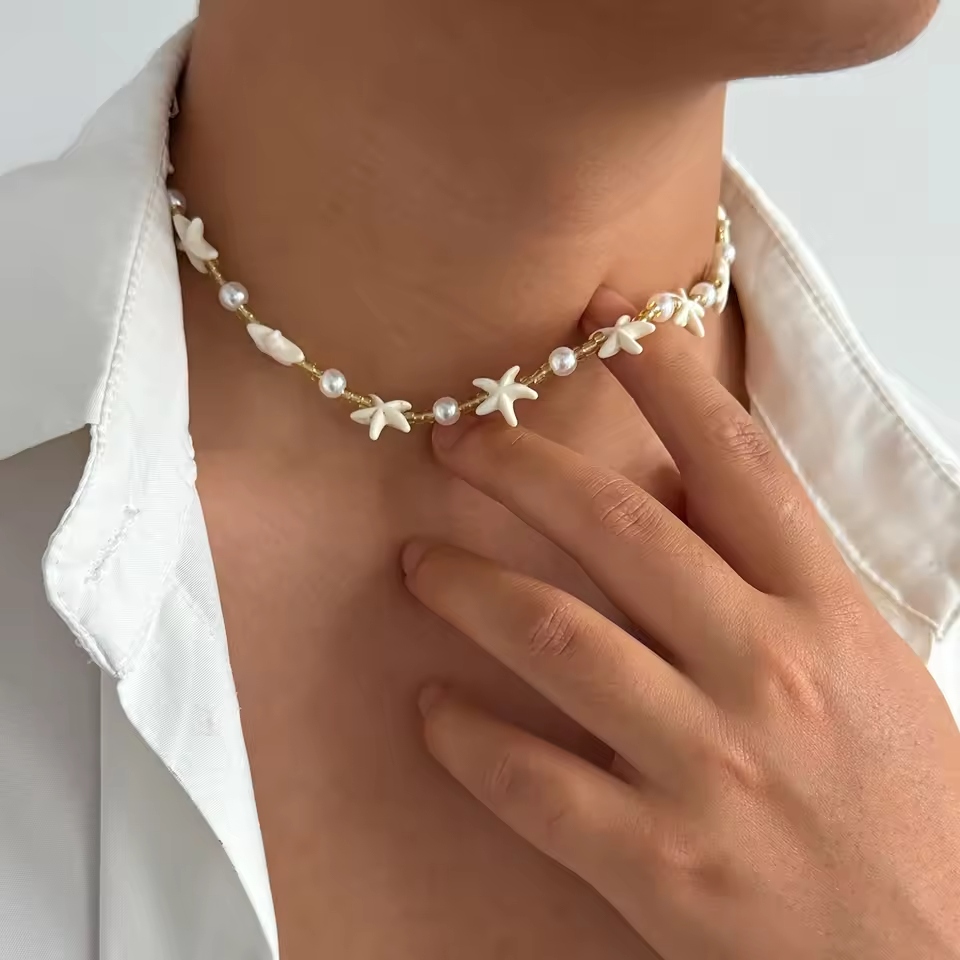 The jewelry overload look celebrates bold accessorizing.