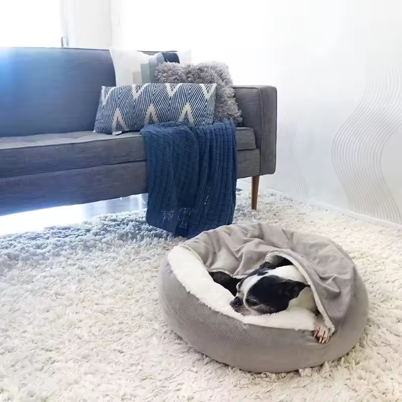 A dog bed with a cover creates a cozy and secure space for your pet.